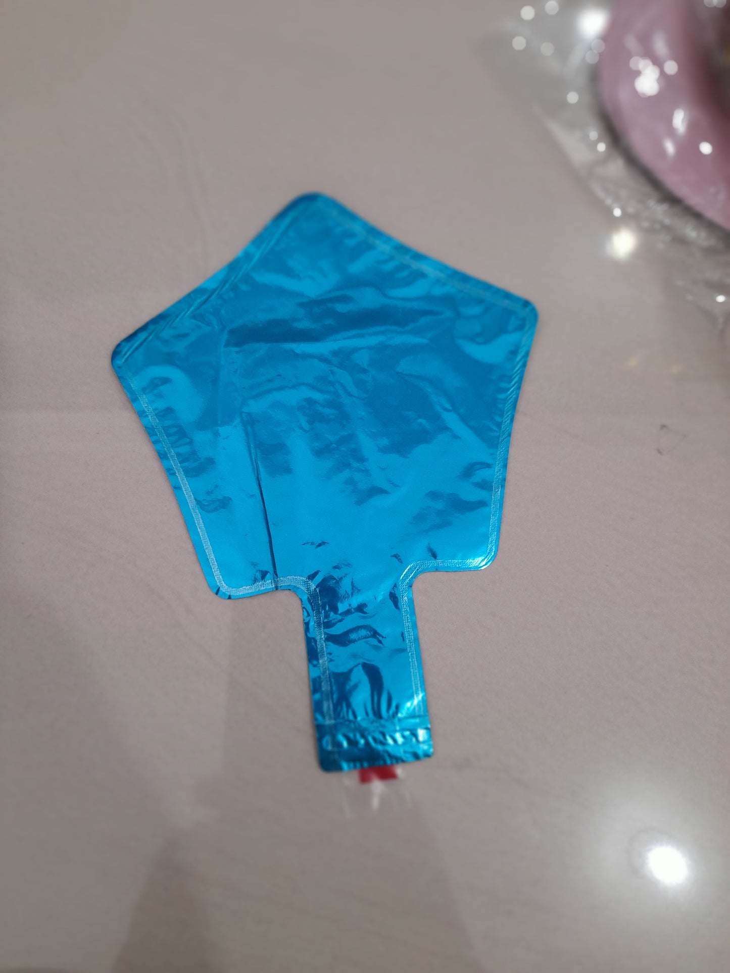 7.6 Globo mini estrella 4" paq.2und
